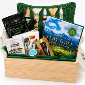 box with gold pillow, book, chocolates and other items