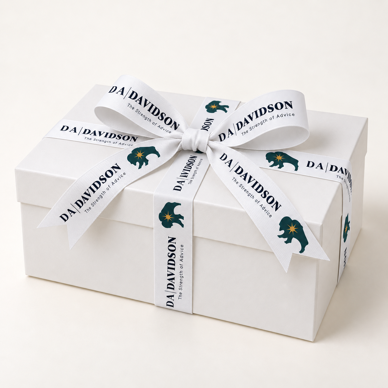 Box wrapped in logo ribbon